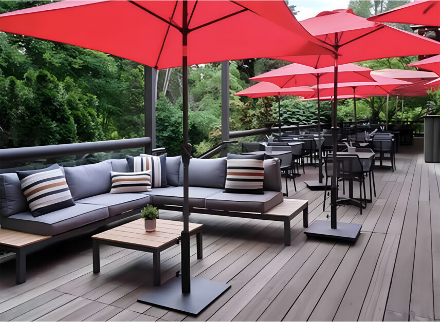 Depicting Stanley's Bar and Grill's patio, empty in the morning light, with umbrella's up.