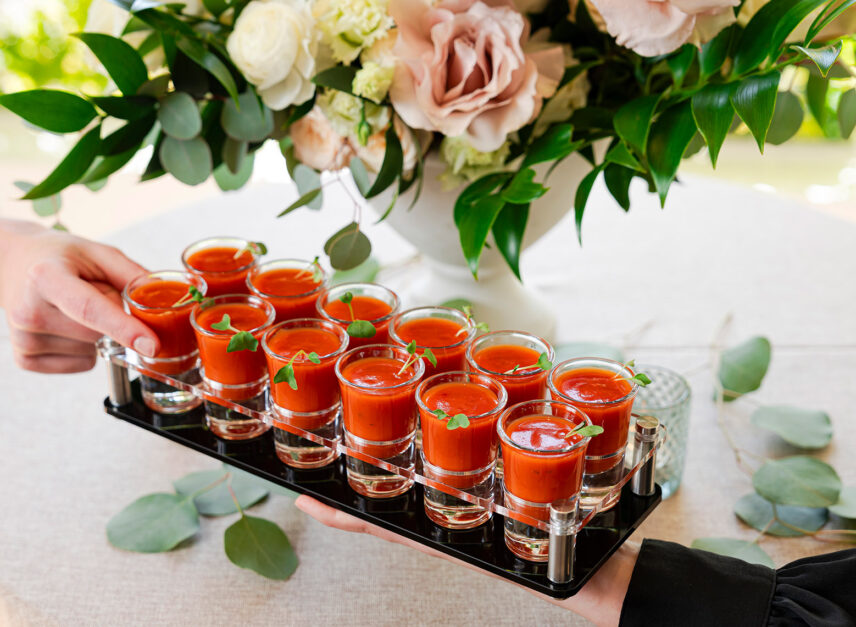 Assorted tomato-based appetizers are presented